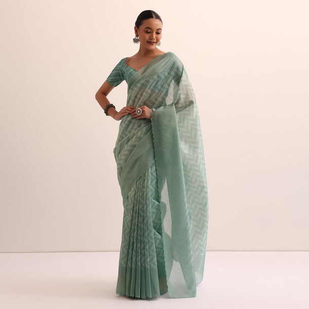 Green Tissue Silk Saree With Stone Embroidery And Unstitched Blouse