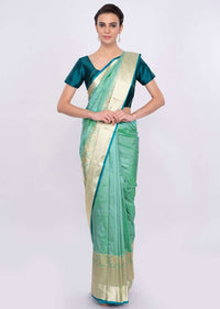 Greenish blue chanderi silk saree with brocade border only on Kalki