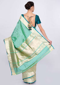 Greenish blue chanderi silk saree with brocade border only on Kalki