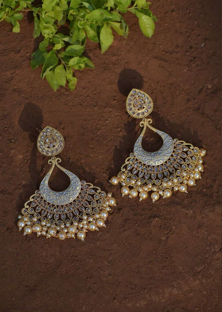 Grey Ethnic Earrings With Carved Floral Design Along With Crystals And Dangling Pearls Online - Kalki Fashion