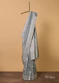 Grey South Silk Saree With Abstract Zari Border And Unstitched Blouse Fabric