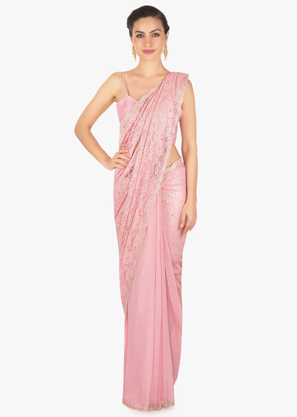 Half and half baby pink saree in Chantilly lace  highlighted in kundan only on Kalki