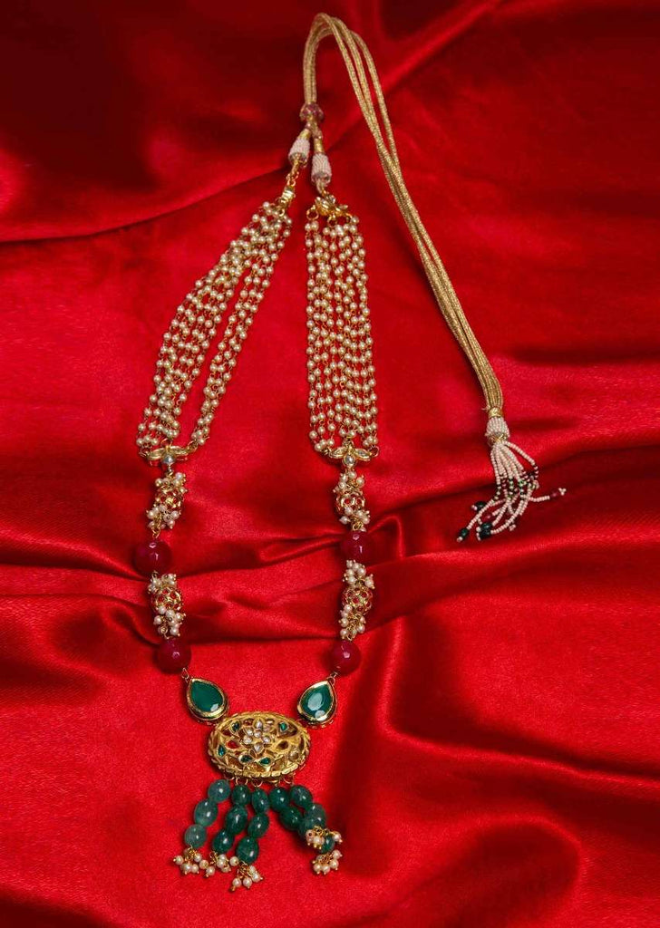 Half and half necklace having upper half in multi string moti layer and lower half in magenta and metallic beads only on Kalki