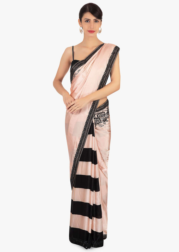 Half and half satin saree in peach and black stripes