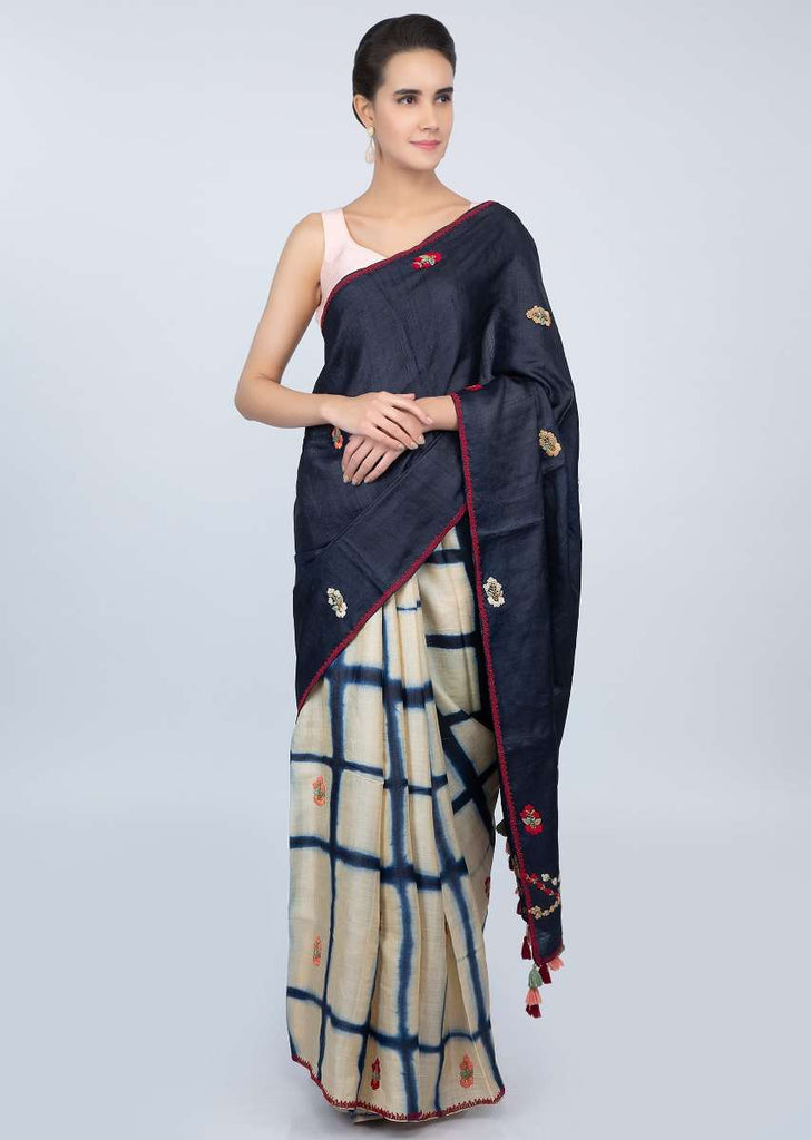 Half and tussar silk saree with batik print in checks and floral embroidered butti only on kalki