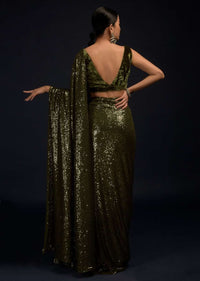 Henna Green Ready Pleated Saree Embellished In Sequins With A Matching Velvet Blouse With Plunging Neckline