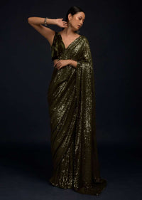 Henna Green Ready Pleated Saree Embellished In Sequins With A Matching Velvet Blouse With Plunging Neckline