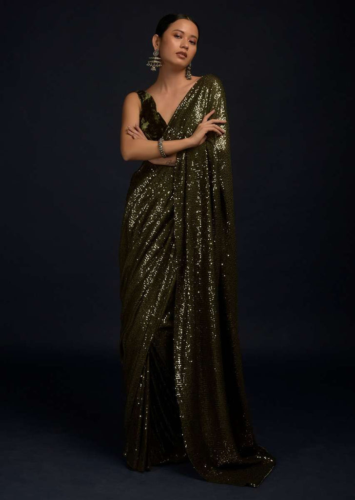 Henna Green Ready Pleated Saree Embellished In Sequins With A Matching Velvet Blouse With Plunging Neckline