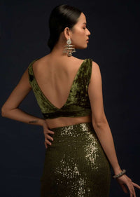 Henna Green Ready Pleated Saree Embellished In Sequins With A Matching Velvet Blouse With Plunging Neckline