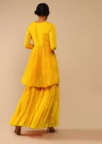 Honey Yellow Sharara Suit In Crepe With Bandhani And Lehariya Print Paired With Moti Embroidered Peplum Kurti