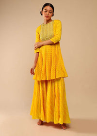 Honey Yellow Sharara Suit In Crepe With Bandhani And Lehariya Print Paired With Moti Embroidered Peplum Kurti