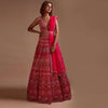 Hot Pink Lehenga Choli In Net With Mirror Work In Floral And Mughal Motifs Along With A Tassel Belt