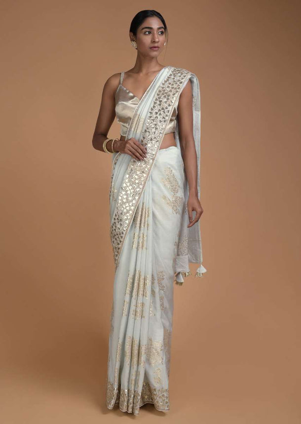 Icy Blue Saree In Silk With Weaved Floral Motifs In Repeat Pattern Online - Kalki Fashion