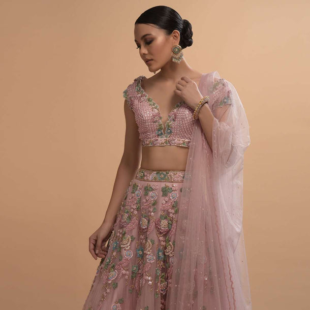 Icy Pink Net Lehenga And Cap Sleeves Crop Top With 3D Flower Cluster And Scattered Buttis