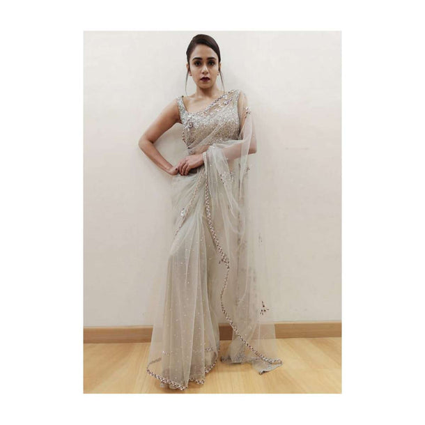 Amruta Khanvilkar in Kalki grey sheer net saree with floral embroidered butti