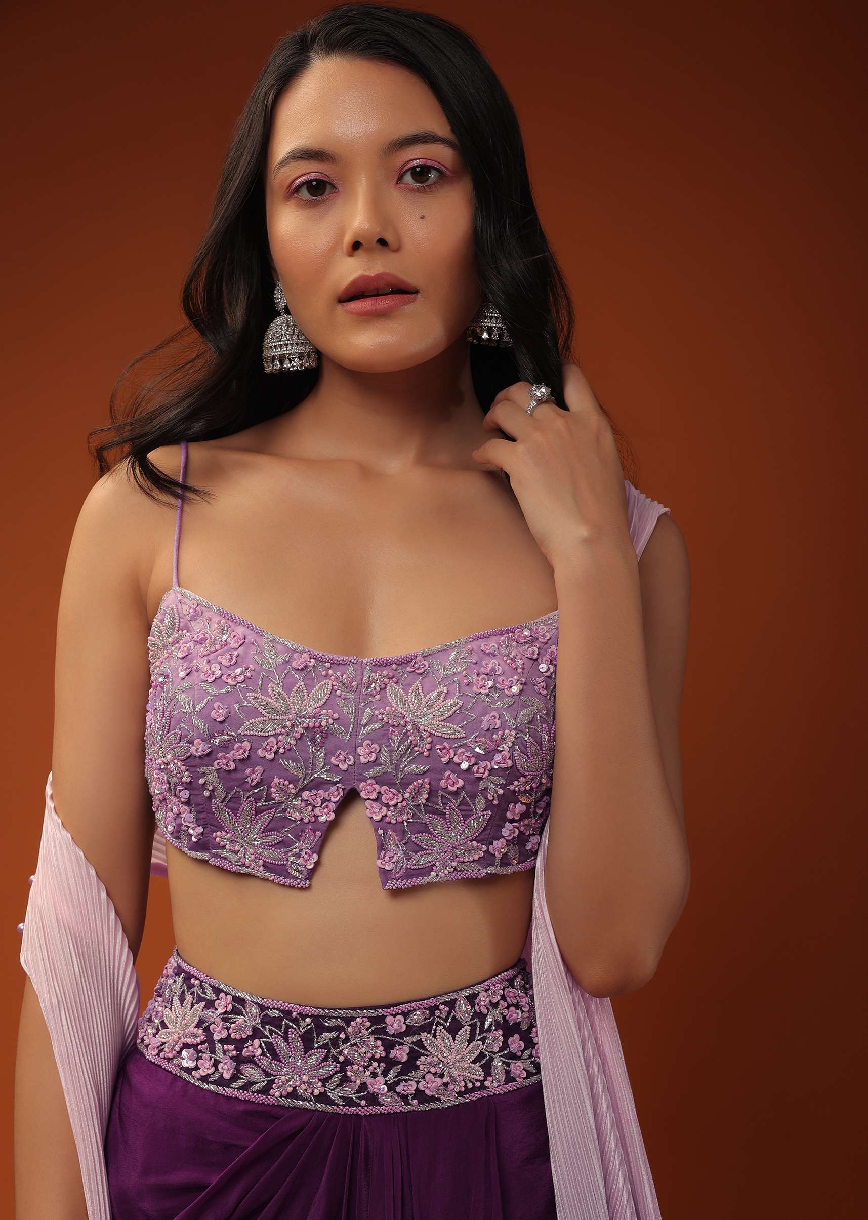 Imperial Purple Dhoti Skirt And A Crop Top In Sequins Embroidery, Paired With A Ombre Extended Jacket In Sleeveless