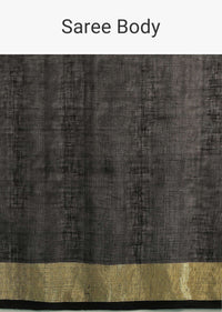 Ink Black Saree In Linen With Golden Brocade Border And Striped Pallu Along With A Matching Unstitched Blouse