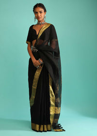 Ink Black Saree In Linen With Golden Brocade Border And Striped Pallu Along With A Matching Unstitched Blouse