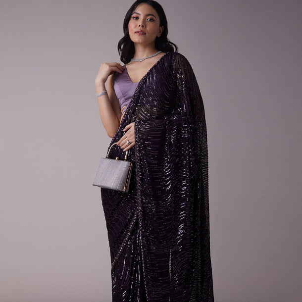 Wine Purple Sequins Saree With An Embellished Border