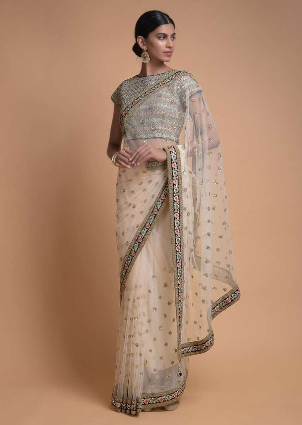 Ivory Beige Saree In Net With Floral Buttis And Resham Embroidered Floral Border Online - Kalki Fashion