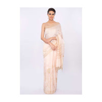 Ivory linen saree in floral jaal embroidery only on kalki