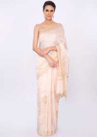 Ivory linen saree in floral jaal embroidery only on kalki