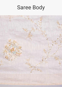 Ivory linen saree in floral jaal embroidery only on kalki