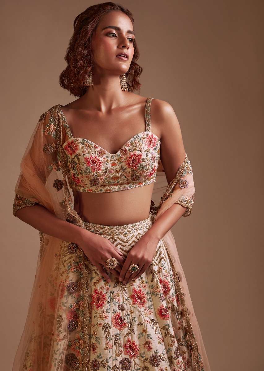 Ivory Lehenga Choli In Raw Silk With Colorful Resham Spring Blooms And Geometric Motifs