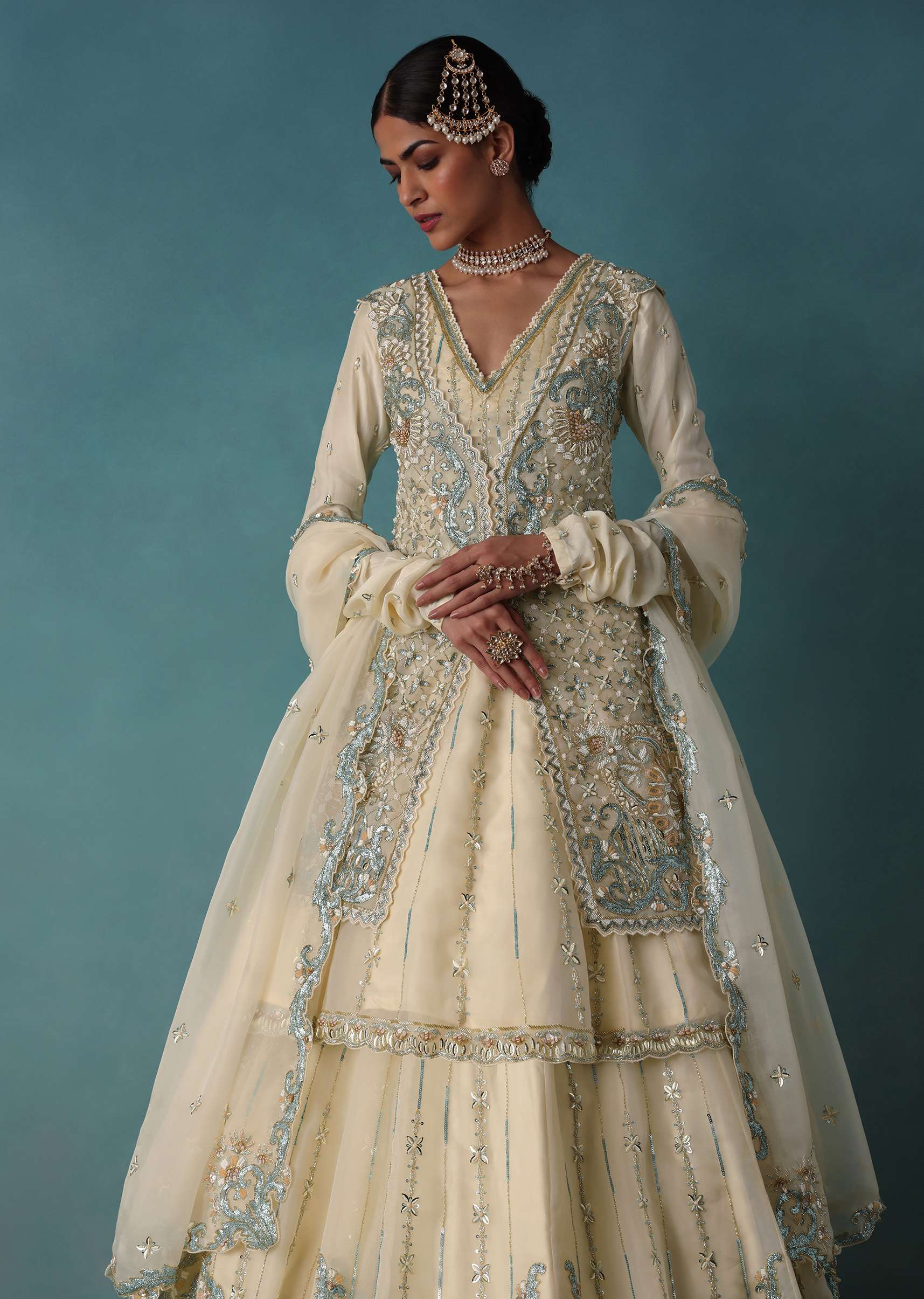 Ivory White Embroidered Bridal Lehenga With Kurta And Jacket