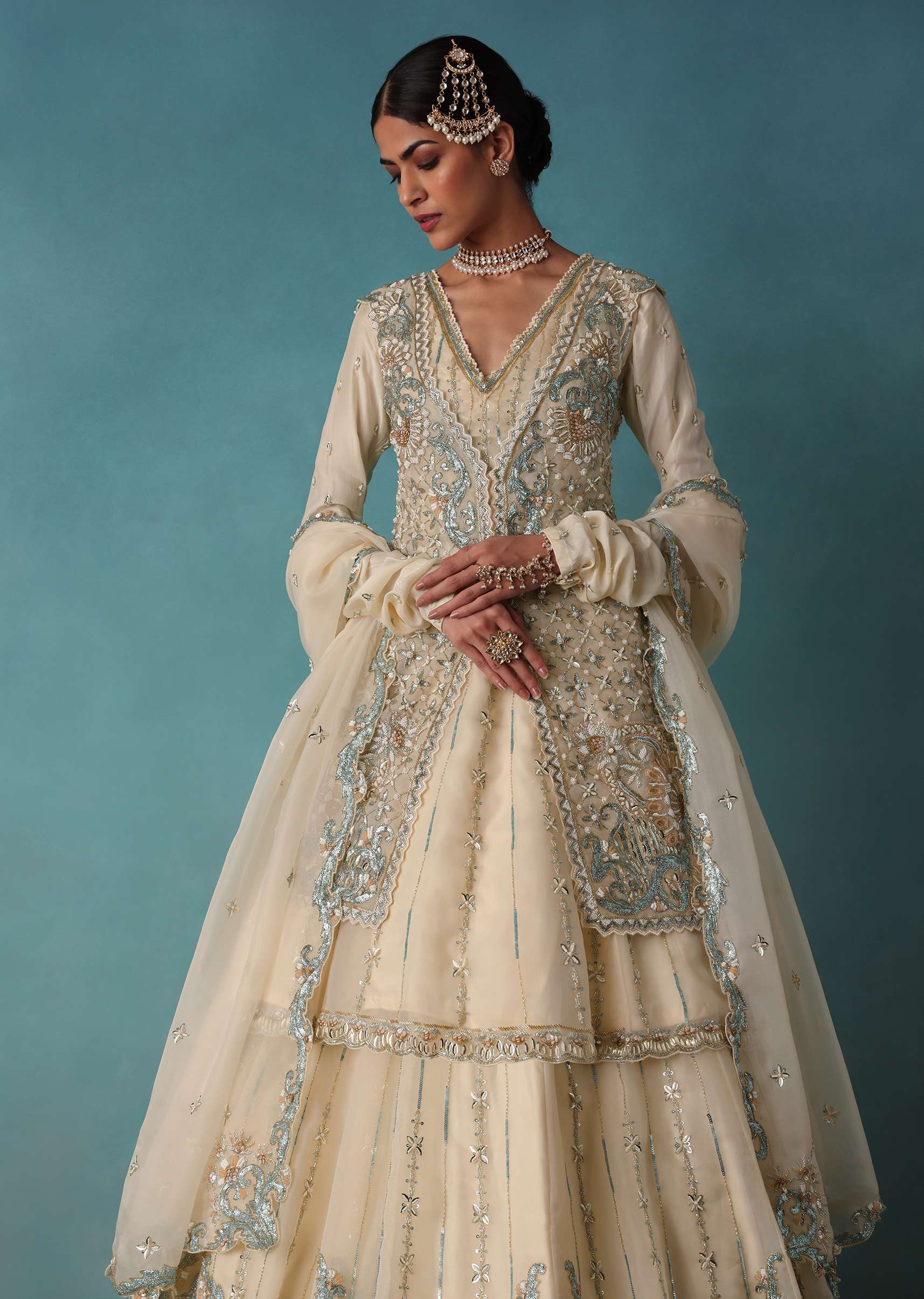 Ivory White Embroidered Bridal Lehenga With Kurta And Jacket