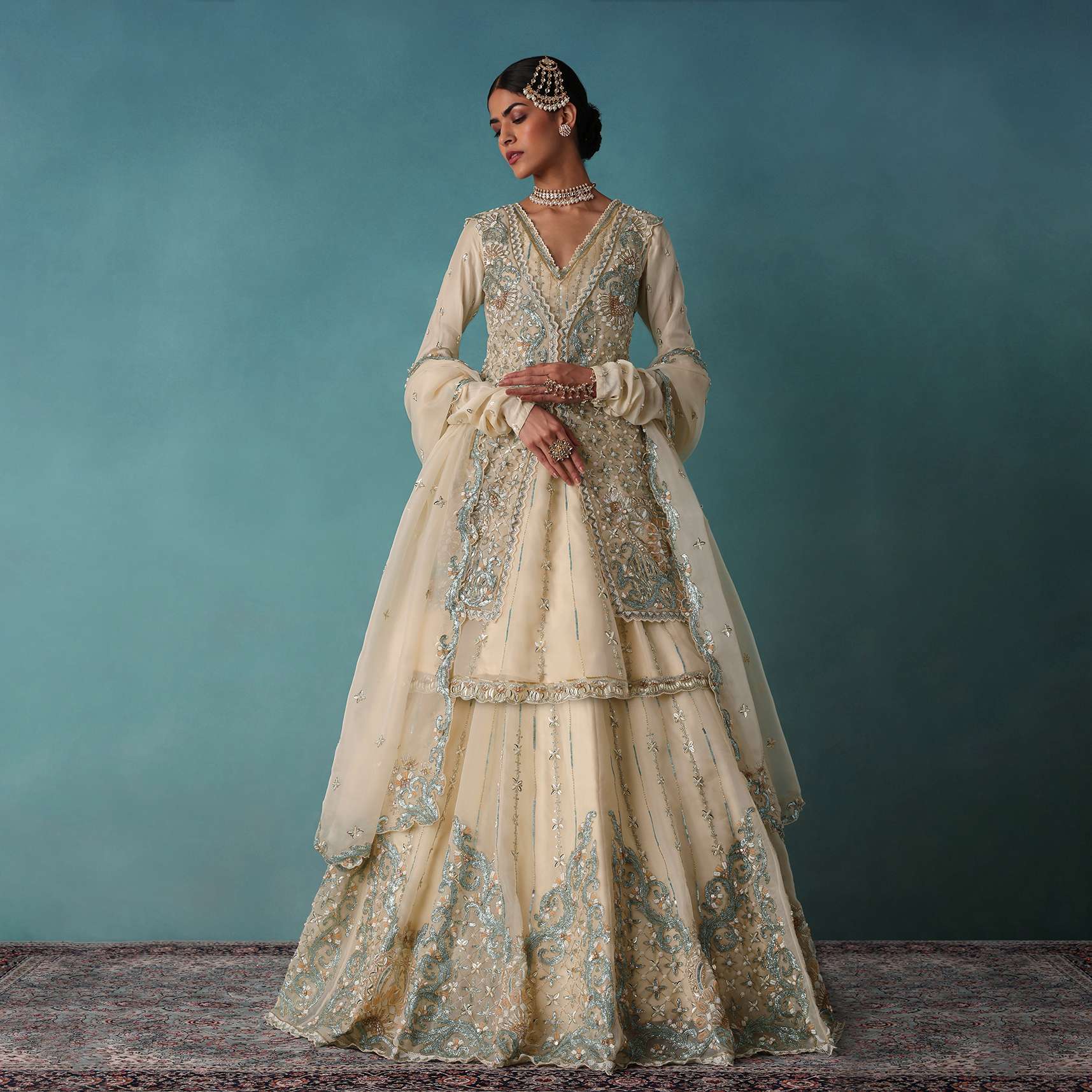 Ivory White Embroidered Bridal Lehenga With Kurta And Jacket