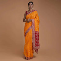 Fire Yellow Saree With Weaved Floral Buttis And Bandhani Printed Pallu Online - Kalki Fashion
