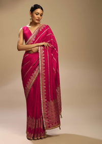 Rani Pink Saree In Silk With Woven Stripes Floral Motifs On The Border