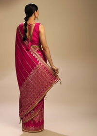 Rani Pink Saree In Silk With Woven Stripes Floral Motifs On The Border