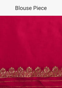 Rani Pink Saree In Silk With Woven Stripes Floral Motifs On The Border