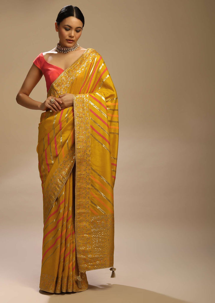 Mustard Saree In Dola Silk With Multi Colored Woven Diagonal Stripes And Floral Border