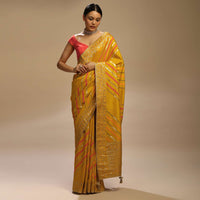 Mustard Saree In Dola Silk With Multi Colored Woven Diagonal Stripes And Floral Border