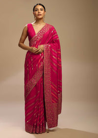 Rani Pink Saree In Dola Silk With Multi Colored Woven Diagonal Stripes And Floral Border