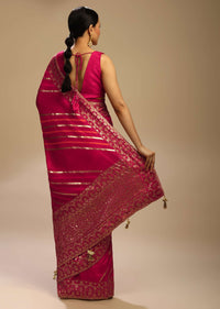 Rani Pink Saree In Dola Silk With Multi Colored Woven Diagonal Stripes And Floral Border