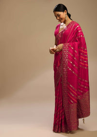 Rani Pink Saree In Dola Silk With Multi Colored Woven Diagonal Stripes And Floral Border