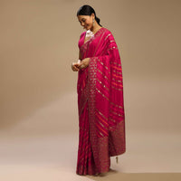 Rani Pink Saree In Dola Silk With Multi Colored Woven Diagonal Stripes And Floral Border