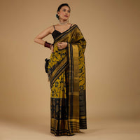 Kalki Antique Moss Green And Black Saree In Silk With Ikat Weave Patola Floral Work
