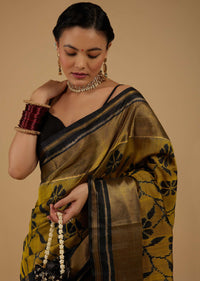 Kalki Antique Moss Green And Black Saree In Silk With Ikat Weave Patola Floral Work