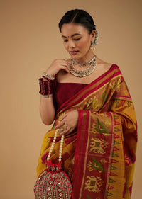 Ocher Yellow Saree In Silk With Ikat Weave Patola Work