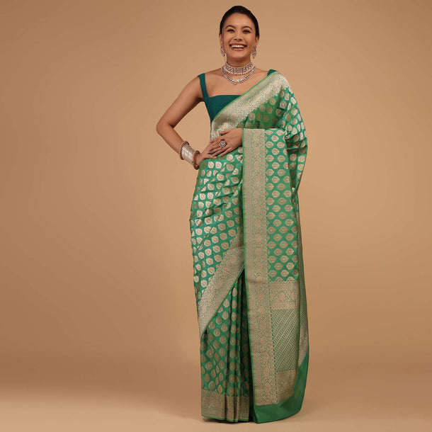 Atlantis Green Saree In Pure Banarasi Silk With A Summer Green Luminous Shade And Upada Zari Weave Floral Butti Work