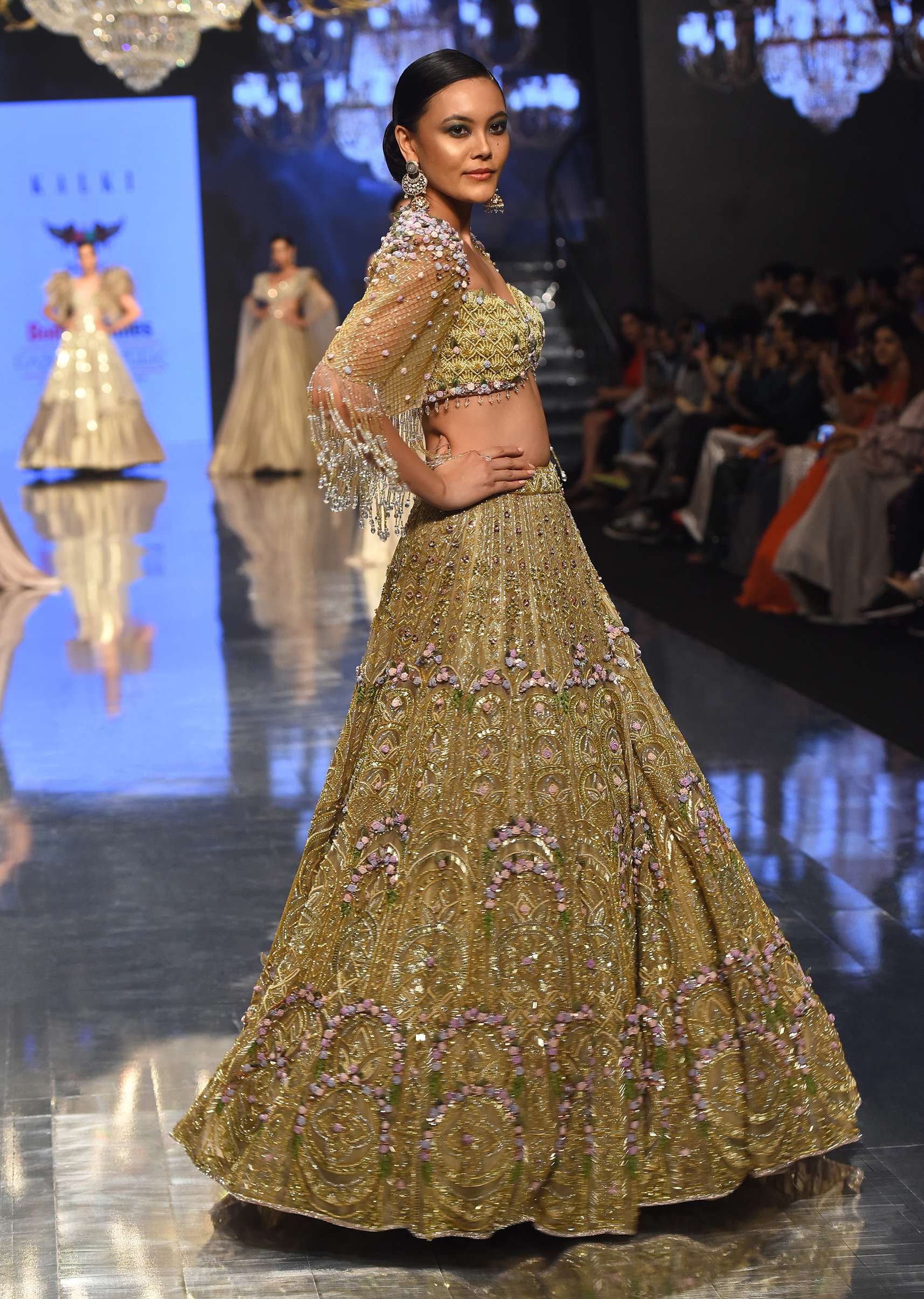 Gold Toned Bridal Naziaa Beige Lehenga With 3D FLoral Embroidery And An Embroidered Shoulder Rest- NOOR 2022
