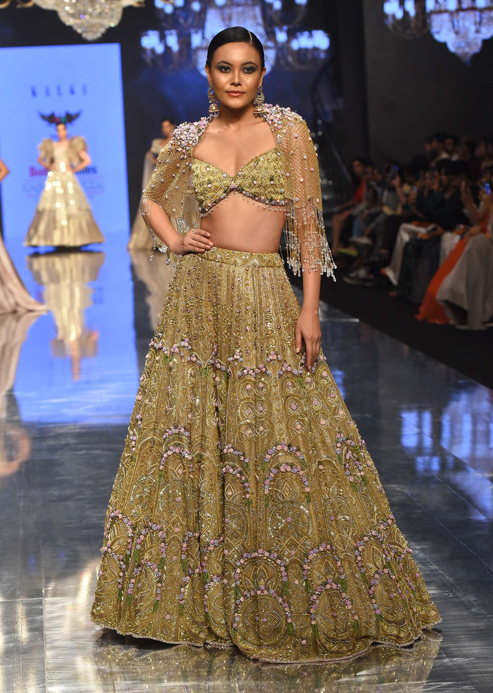 Gold Toned Bridal Naziaa Beige Lehenga With 3D FLoral Embroidery And An Embroidered Shoulder Rest- NOOR 2022