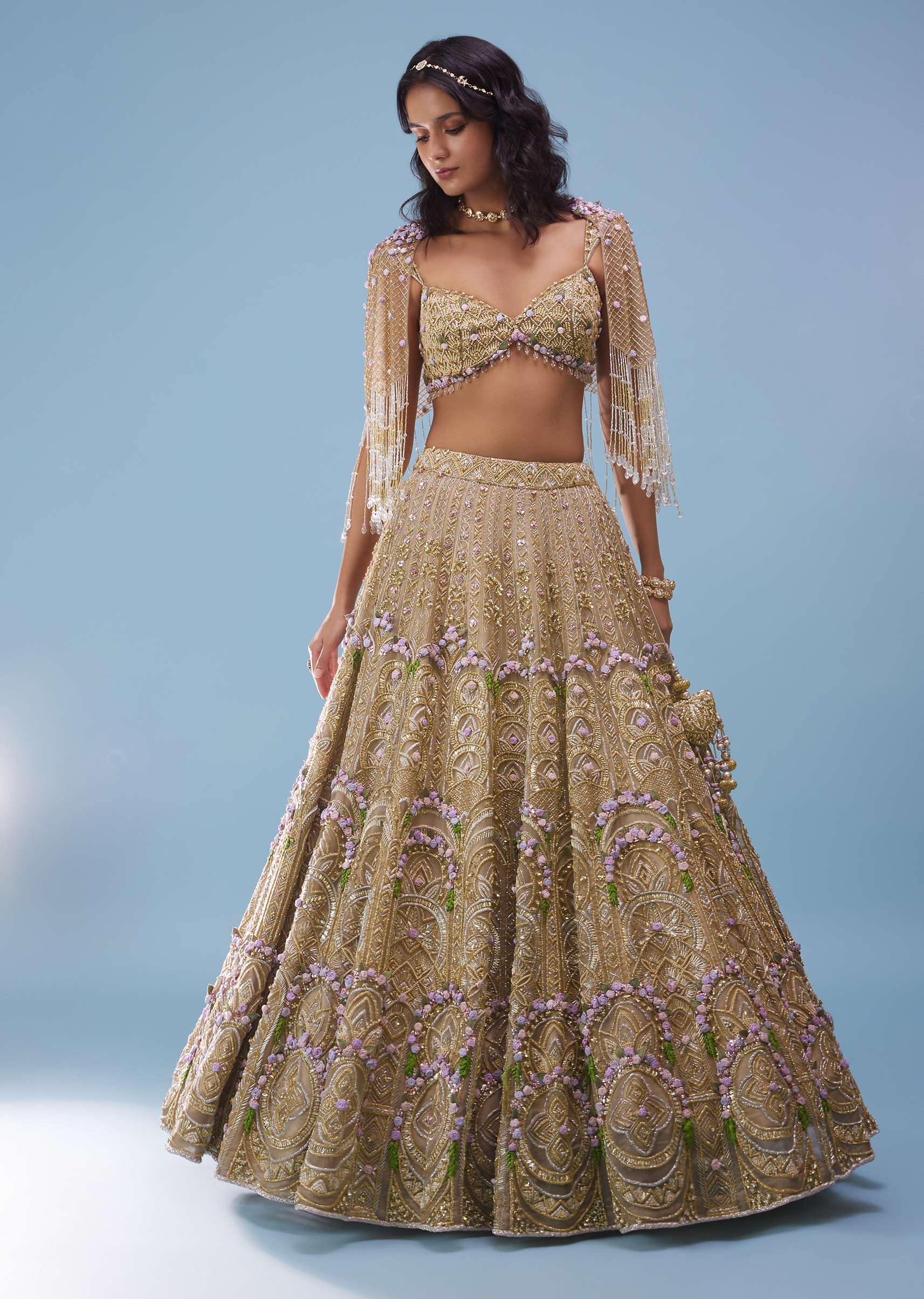 Gold Toned Bridal Naziaa Beige Lehenga With 3D FLoral Embroidery And An Embroidered Shoulder Rest- NOOR 2022