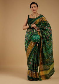 Deep Green Saree In Silk With Ikat Weave Patola Work