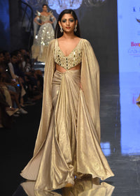 Mocha Brown Gown With A Pre-Pleated Dhoti Skirt Area And Royal Cape Sleeves- NOOR 2022